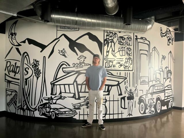 In celebration of Davis Elen's 75-year legacy, artist Beau Brown created a historical mural in our downtown Los Angeles office. This artwork pays tribute to DE's journey, showcasing pivotal moments from our rich history in advertising dating back to 1948.